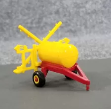 ERTL 1/64 Red & Yellow Pull Type Sprayer