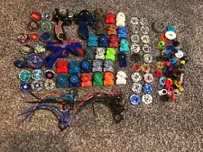 LOT 75+ PIECES BEYBLADES METAL + LAUNCHERS + PARTS and PIECES