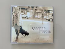 SANDRINE CD TRIGGER