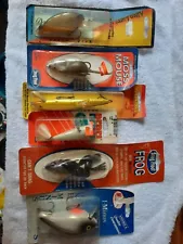 Fishing Lures brand new in packages but over 20 years old .