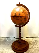 A vintage / antique style globe bar for holding drinks