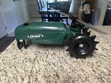 Traveling Sprinkler Raintrain Garden Tractor Sprinkle Water Orbit Green