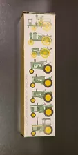 Vintage Eight John Deere Miniature Toy Tractors In Original Box