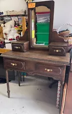 antique wood vanity with mirror