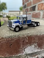 1:64 DCP Mack Superliner w/ Bunk. White/ Blue.