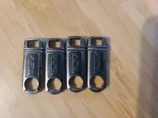 TUMI Zipper Pulls for Sale. Four Pieces.