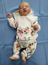 Reborn baby doll approximately 19"