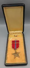 WWII/2 US Bronze Star Medal slot broach with lapel pin and ribbon and named zig