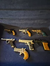 old vintage metal cap guns