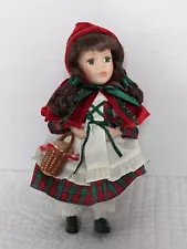 Vintage Geppeddo 9" Red Riding Hood porcelain doll from the Fairy Tales series.