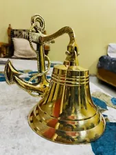 beautiful brass bell is perfect for adding a nautical touch to any room