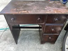 Solid Wooden Desk With Three Drawers One Piece Keyboard Tray Mahogany?