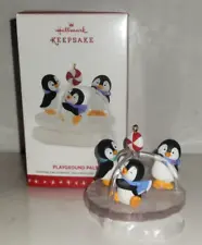 Hallamrk Keepsake Playground Pals ornament merry go round penguins