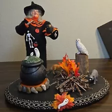 Halloween Paper Mache Witch Sitting Around A Handmade Campfire with animals