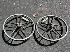 A Pair Of Aluminum Bike Star Mag Wheels