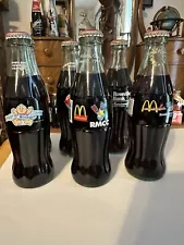 This Sale Is For 6 Different Very Sought After 8oz Coca Cola Bottles