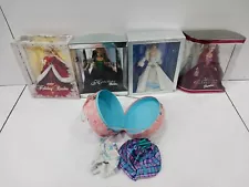 Bundle of Four Mattel Holiday Limited Edition Barbie Collection