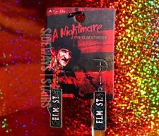 NIGHTMARE ON ELM STREET SIGN EARRINGS Freddy Krueger enamel horror jewelry RARE