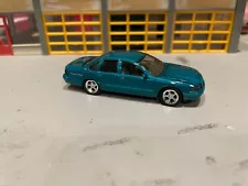 1/64REVELL 96 IMPALA SS/MET TEAL/BLK INT/350 V8/TORQ-THRUST WHEELS/RUBBER TIRES