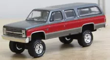 Greenlight Custom lifted gray/red Chevy K20 Suburban 1/64 no box