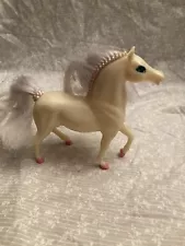 plastic white horse with pink hooves. Synthetic mane and tail. 5 in. Blue eye