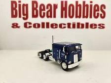 1/64 DCP/FG JR Shugle Big Bunk 352 Peterbilt 110" Cabover Tractor