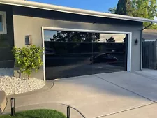 Ultra Modern Black Frameless Glass Garage Doors w/ NOW Technology