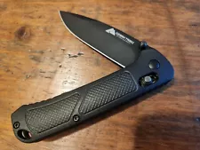 Ozark Trail 7.5 inch D2 High Carbon Steel Slide Lock Folding Knife BLACK SCALES