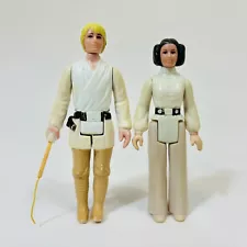 Vintage Luke Skywalker Farm Boy Lightsaber & Princess Leia 1977 Action Figure