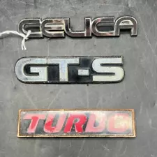 1982-1985 Toyota Celica OEM Exterior Rear Emblem Badge Set Turbo GT-S Ornaments