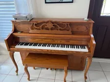 Samick upright piano, with matching bench