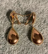 Up for sale is a 14K yellow gold omega back earrings stamped 14K