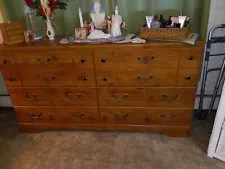 Ashley 6 pc Queen bedroom set. oak color, slightly used