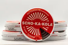 Set of five Scho-Ka-Kola empty tins