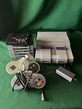 Super Nintendo Console, Two Controllers and 6 games