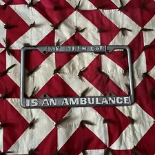 Vintage Metal License Plate Frame Comedy Ambulance Humor Worn