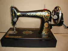 ANTIQUE SINGER SEWING MACHINE MODEL 66 "RED EYE" ,HAND CRANK, SERVICED