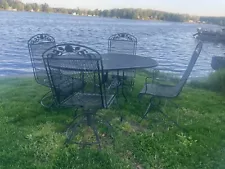 Patio dining table and chair set. Wrought iron!