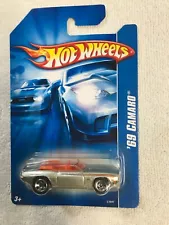 2007 Hot Wheels 69 Camaro Convertible - Silver orange interior