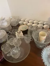 china dishes ( 12 cups, 10 dinner plates, 12 bread plates, and other items)