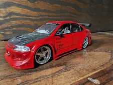 Jada Toys Design Mitsubishi Lancer Evolution VI Import Racer 1:24