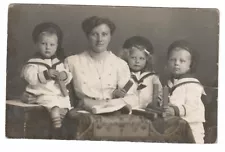 New Listing107 75 - Photo Postcard * Mother with her 3 Children * Sailor Look * 1917