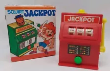 Vintage Squirt Jackpot Plastic Joke Slot Machine w/ Original Box 5" Tall