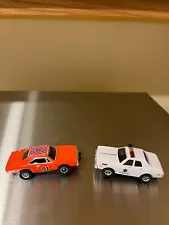 AutoWorld Slot Car Dukes of Hazzard General Lee & Cop Car