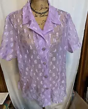 Lavendar net-like top see thru w/ embroidered flowers. Perfect summer blouse.