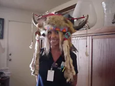 native American medicine man's headdress, with buffalo horns and coyote pelt