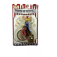 Vintage Circus Figure on Unicycle - Wind-Up Toy