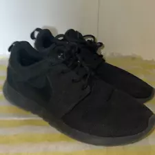 Women’s black Nike Roshe One running shoe