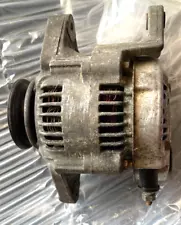 1987 Chevy Sprint Turbo OEM Alternator, this is a working alternator, tested!