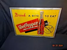 Nice Embossed Dr Pepper "Drink A Bite To Eat" Tin Sign